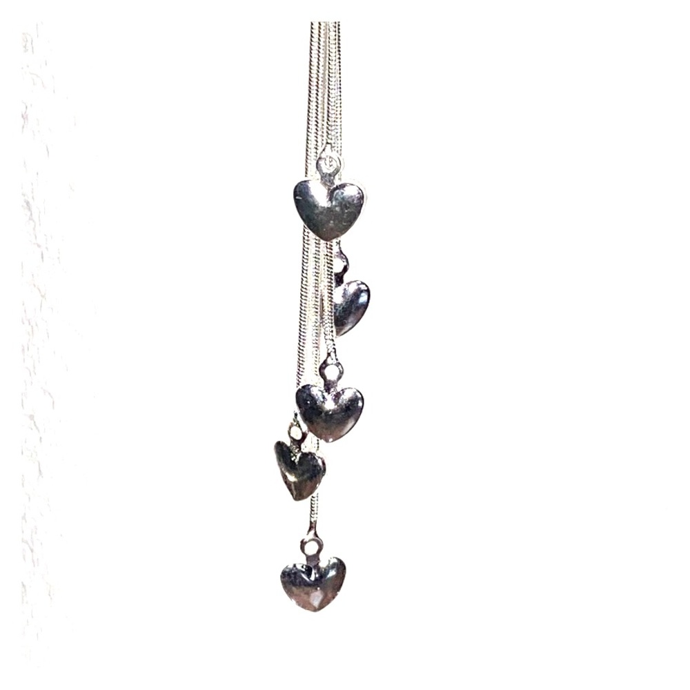 Silver necklace with 5 dangling hearts lariat style